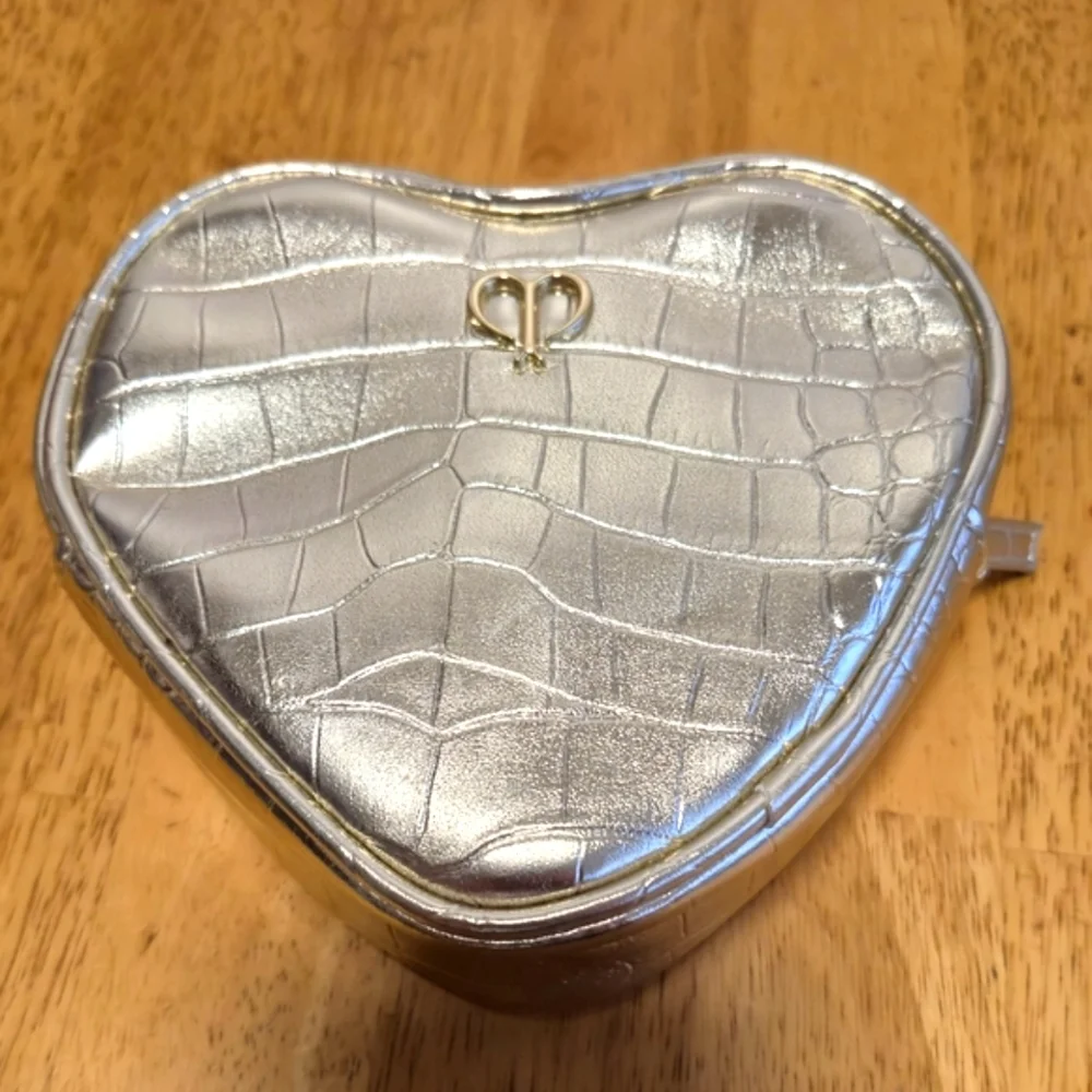 Cle de Peau golden Quilted Cosmetic Bag